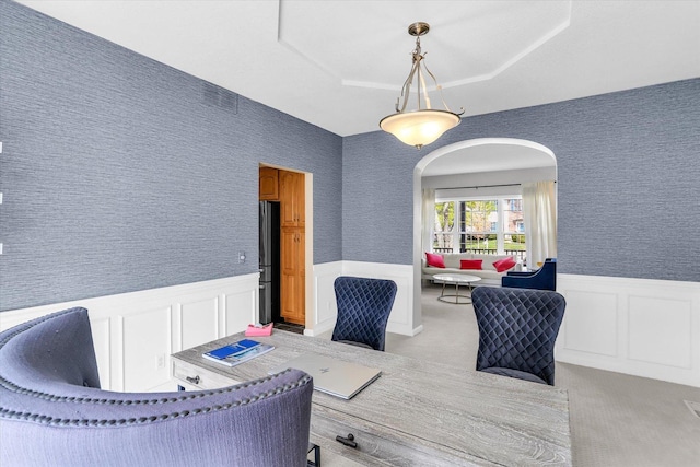 3402 Mill Creek Ct, Champaign, IL 61822 - interior space with arched walkways, light carpet, and wainscoting