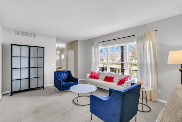 3402 Mill Creek Ct, Champaign, IL 61822 - living area with baseboards, visible vents, and carpet