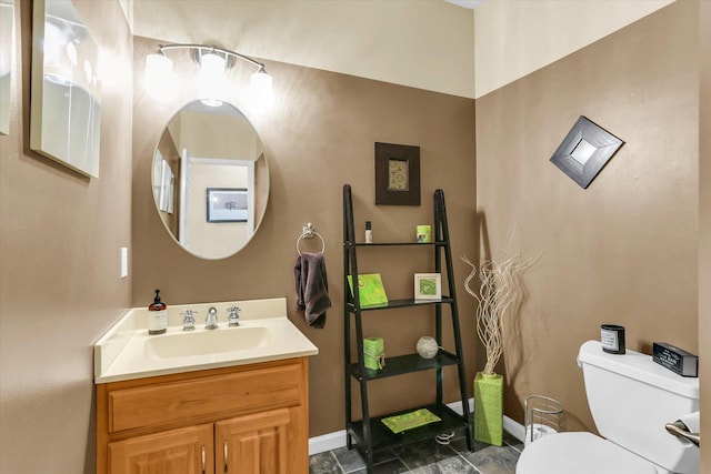 3402 Mill Creek Ct, Champaign, IL 61822 - bathroom with toilet, baseboards, and vanity