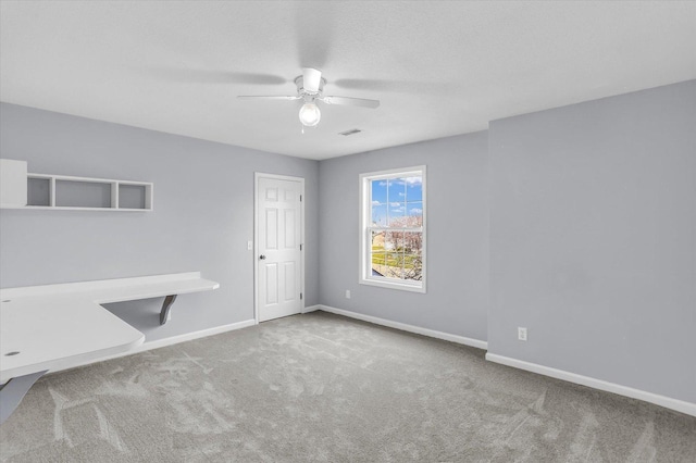 3402 Mill Creek Ct, Champaign, IL 61822 - carpeted spare room featuring baseboards, ceiling fan, and visible vents