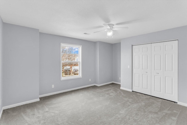 3402 Mill Creek Ct, Champaign, IL 61822 - unfurnished bedroom with baseboards, carpet, ceiling fan, and visible vents