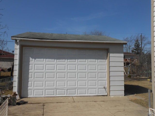 detached garage with fence