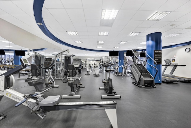 gym with a drop ceiling