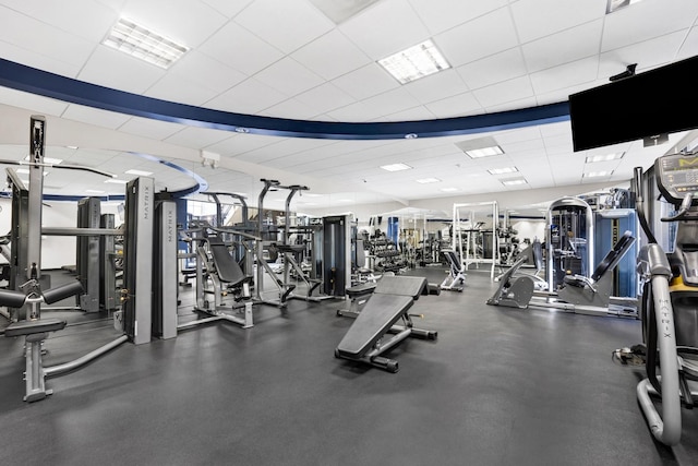 workout area featuring a paneled ceiling and visible vents