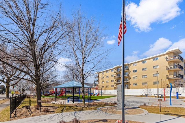 view of building exterior featuring fence