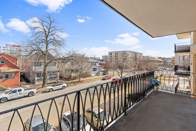 balcony featuring a residential view