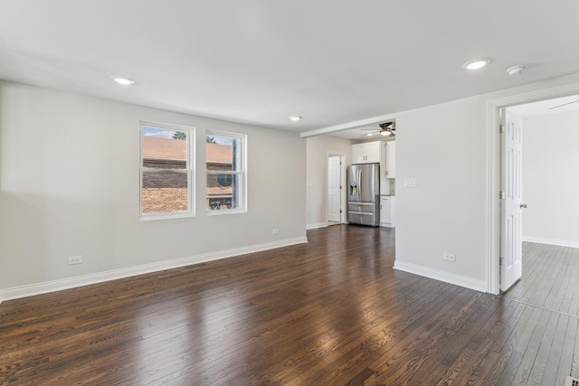 unfurnished living room featuring dark wood finished floors, recessed lighting, baseboards, and ceiling fan