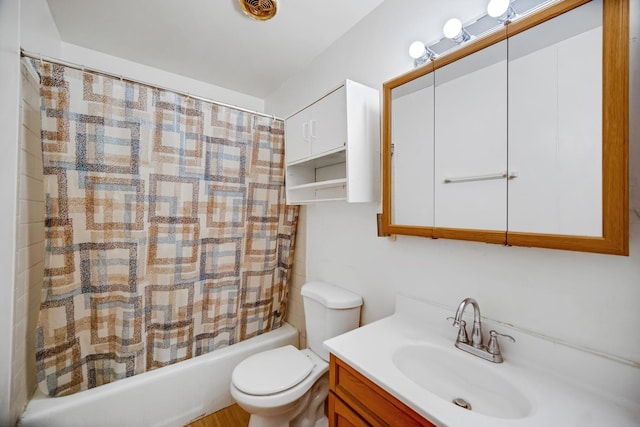 full bath featuring toilet, vanity, and shower / bathtub combination with curtain