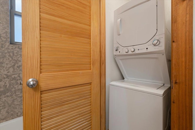 1637 W Pratt Blvd Unit 2W, Chicago, IL 60626 - washroom featuring stacked washer and clothes dryer