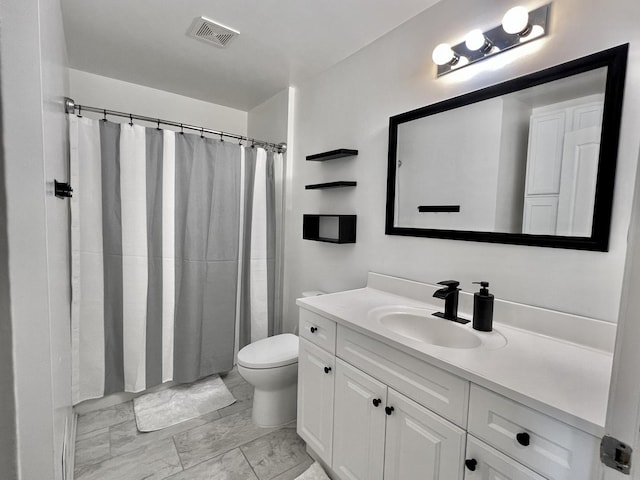 full bath featuring visible vents, toilet, a shower with shower curtain, marble finish floor, and vanity