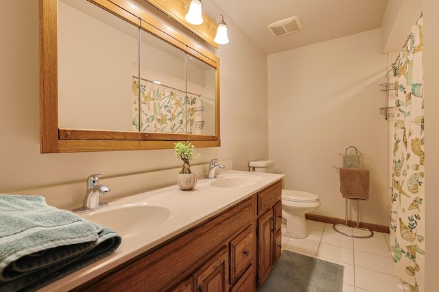 full bathroom featuring tile patterned flooring, toilet, visible vents, and a sink