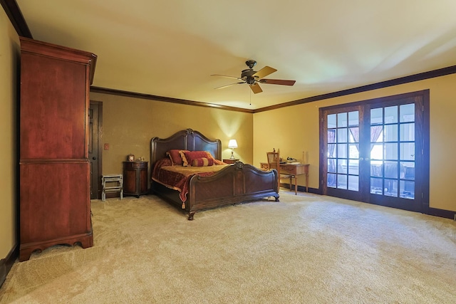 bedroom featuring light carpet, a ceiling fan, baseboards, and ornamental molding