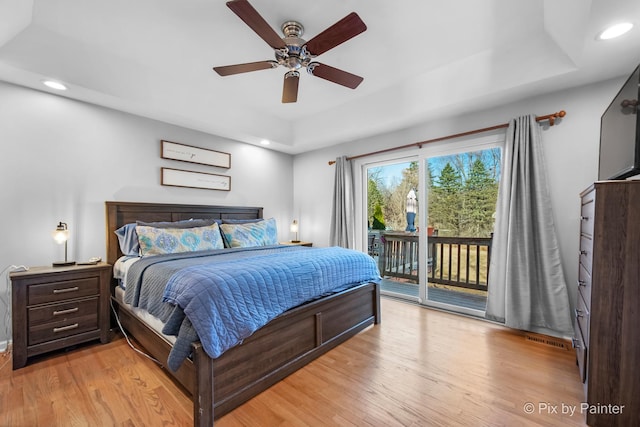 bedroom with a ceiling fan, visible vents, light wood-style flooring, recessed lighting, and access to exterior