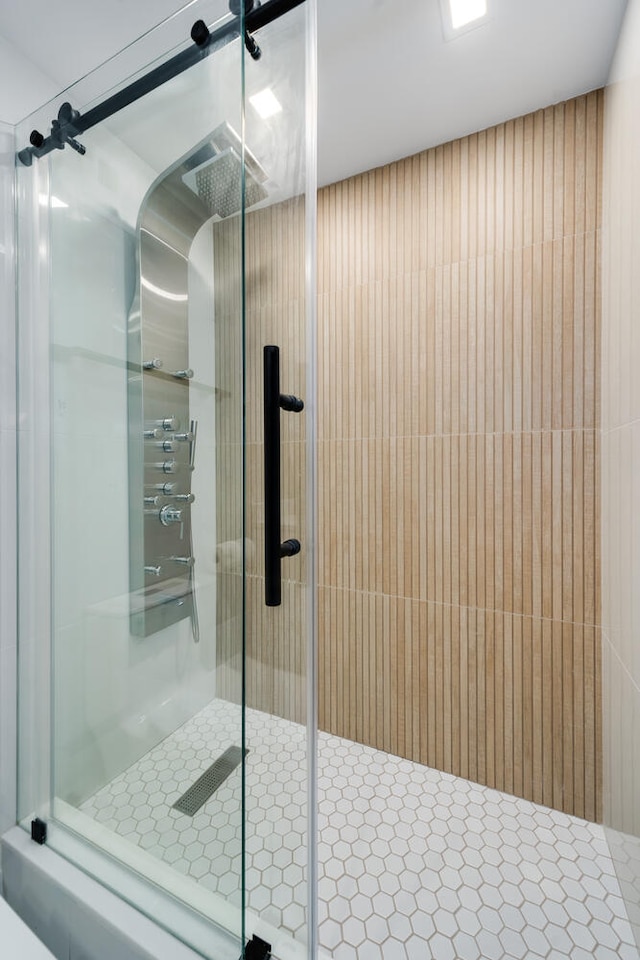 full bathroom with a stall shower