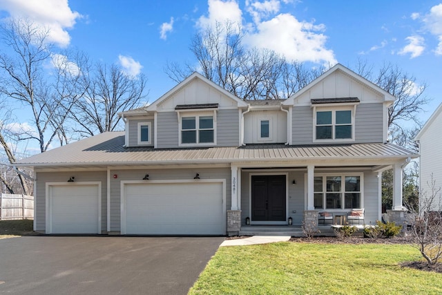 craftsman inspired home featuring a porch, board and batten siding, and metal roof