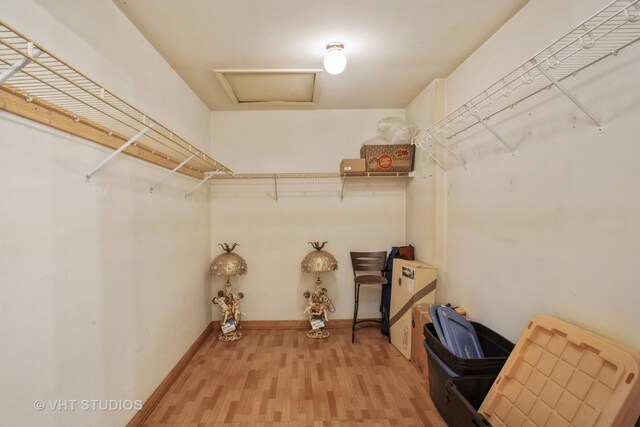 214 S Rush St, Itasca, IL 60143 - walk in closet featuring attic access and light wood-style floors