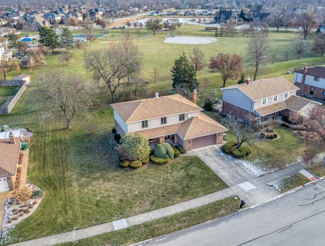 birds eye view of property with a residential view