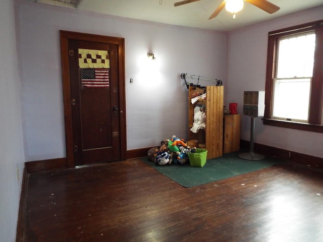 410 S Franklin Ave, Polo, IL 61064 - interior space featuring wood finished floors, ceiling fan, and baseboards