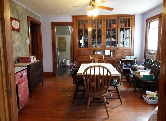 410 S Franklin Ave, Polo, IL 61064 - dining room with ceiling fan, cooling unit, and wood finished floors
