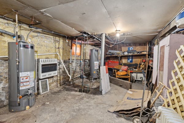 2020 W Superior St, Chicago, IL 60612 - unfinished below grade area with heating unit and gas water heater