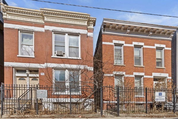 2020 W Superior St, Chicago, IL 60612 - view of front of house featuring brick siding and a fenced front yard