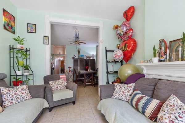2020 W Superior St, Chicago, IL 60612 - tiled living area with a ceiling fan