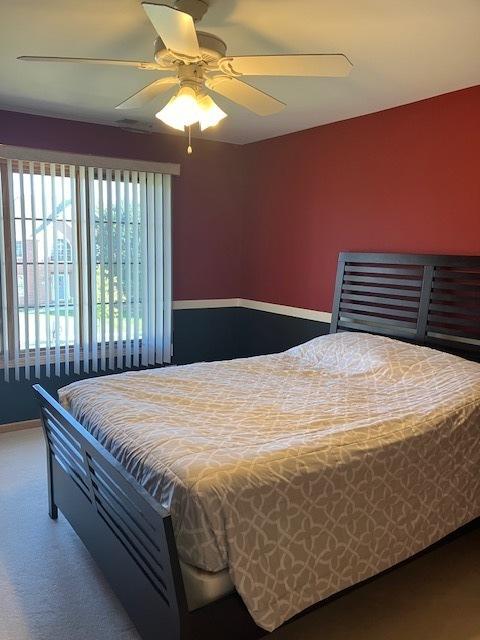 bedroom featuring a ceiling fan