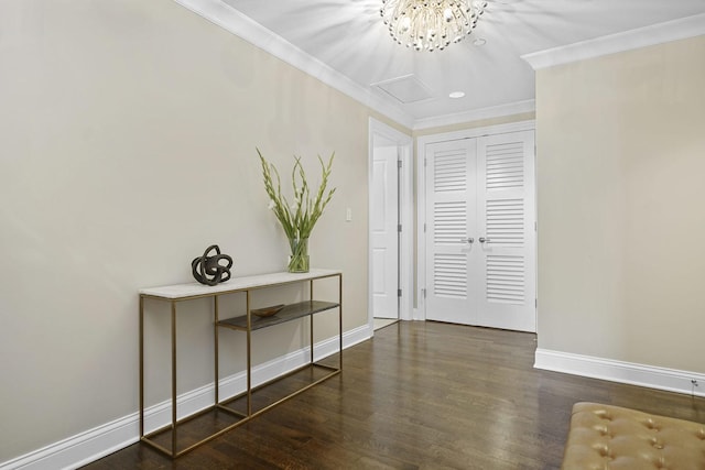 interior space featuring wood finished floors, baseboards, and ornamental molding