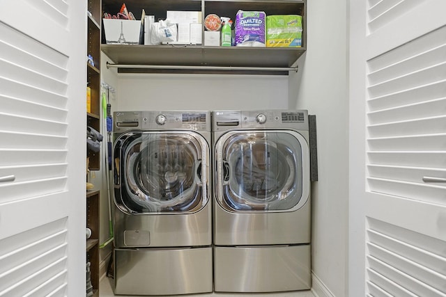 laundry room with laundry area and washing machine and dryer