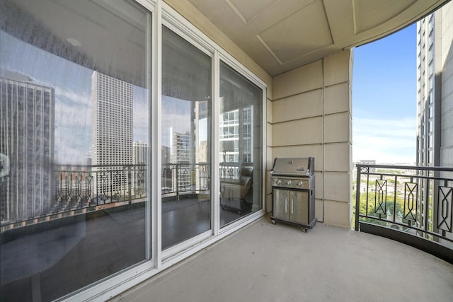 balcony featuring area for grilling