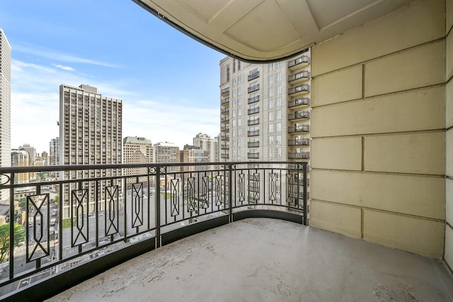 balcony featuring a city view