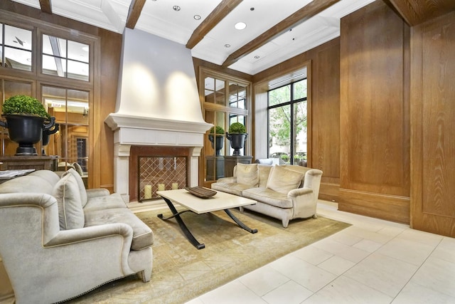 living room featuring a large fireplace, ornamental molding, beam ceiling, light tile patterned floors, and recessed lighting