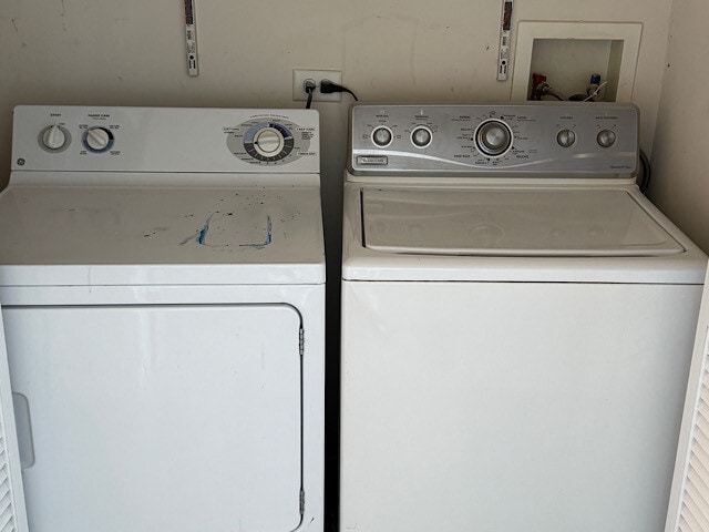 laundry area with washer and clothes dryer