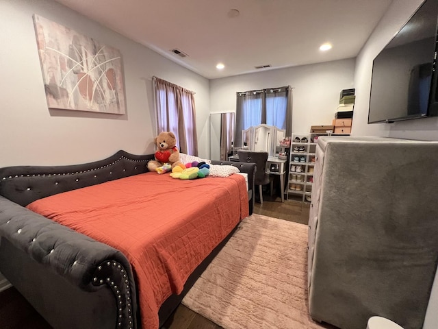 bedroom with recessed lighting and visible vents