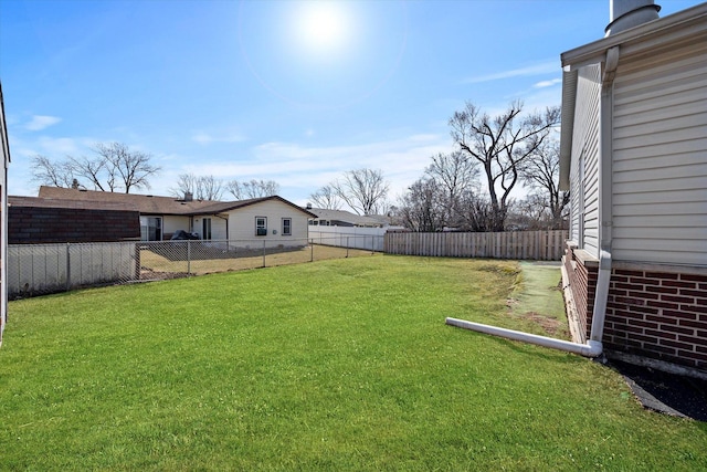 view of yard featuring a fenced backyard