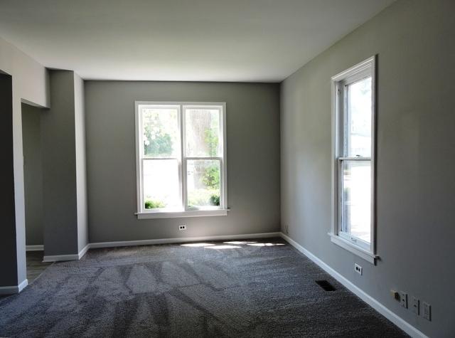 833 Pleasant St, Dekalb, IL 60115 - carpeted spare room featuring healthy amount of natural light and baseboards
