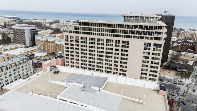 bird's eye view featuring a view of city and a water view