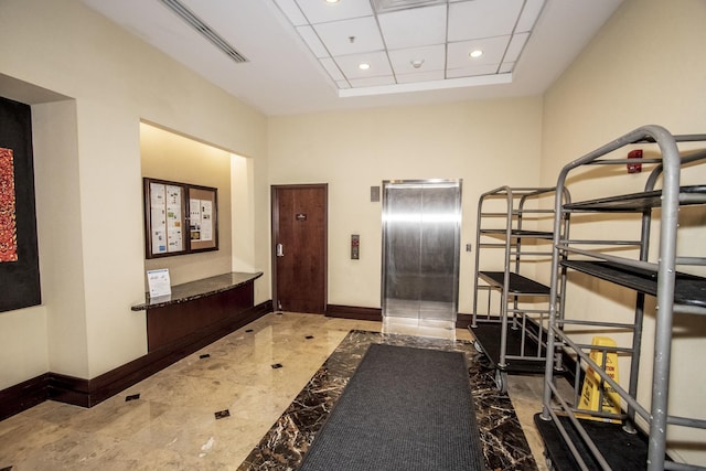 entryway featuring visible vents, marble finish floor, recessed lighting, elevator, and baseboards