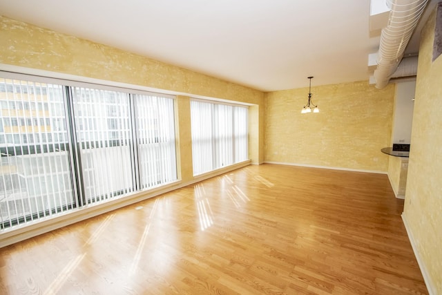 empty room featuring wood finished floors