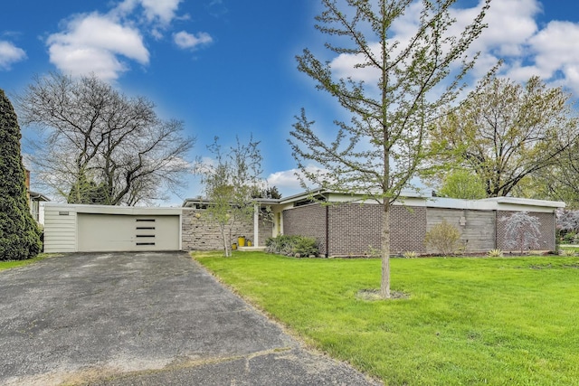 mid-century modern home with a front lawn, a garage, and stone siding