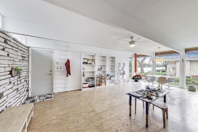 interior space featuring a ceiling fan