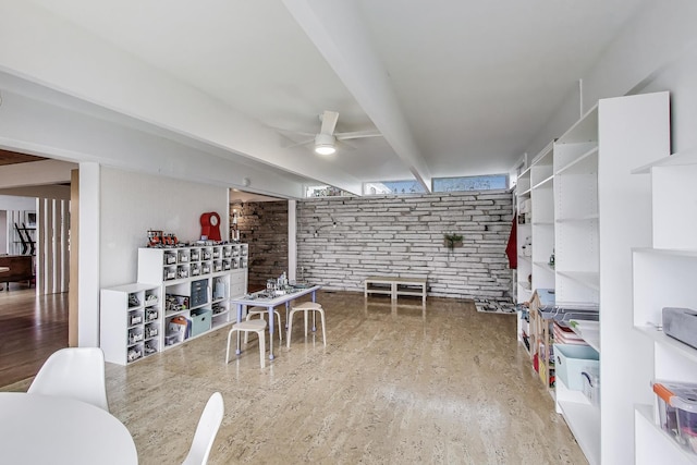 interior space with ceiling fan
