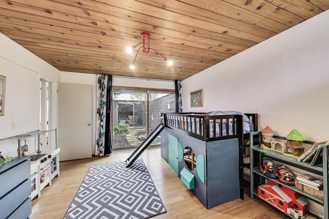 bedroom featuring wooden ceiling and light wood finished floors