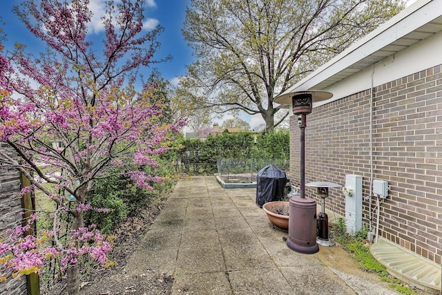 view of patio / terrace featuring fence