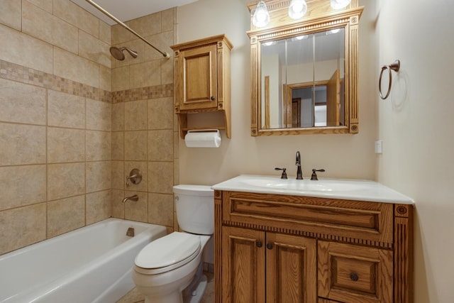 bathroom featuring vanity, toilet, and tub / shower combination