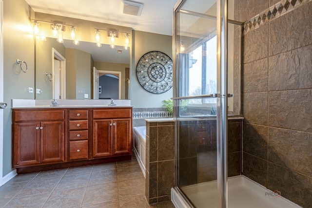 655 N Fox Trl, Round Lake, IL 60073 - bathroom featuring a stall shower, a garden tub, tile patterned flooring, and double vanity