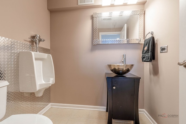 655 N Fox Trl, Round Lake, IL 60073 - bathroom with toilet, baseboards, and vanity