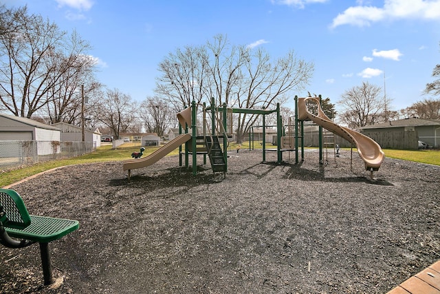 community jungle gym featuring fence