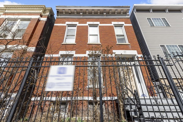 2016 W Superior St, Chicago, IL 60612 - exterior space featuring brick siding and fence private yard
