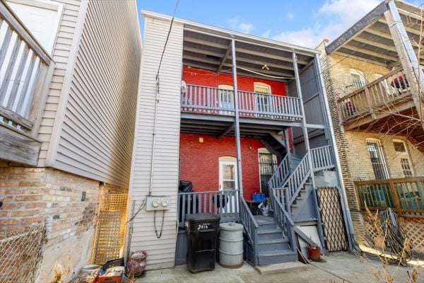 2016 W Superior St, Chicago, IL 60612 - rear view of house featuring brick siding and stairs